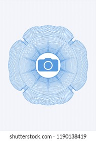 Light blue linear rosette with photo camera icon inside