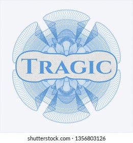 Light blue linear rosette with text Tragic inside