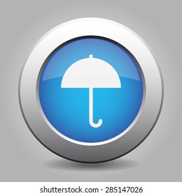 light blue metal button with white umbrella