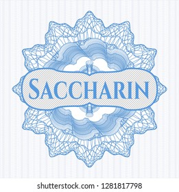 Light blue money style emblem or rosette with text Saccharin inside