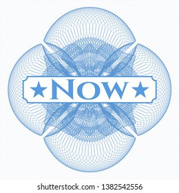 Light blue money style rosette with text Now inside