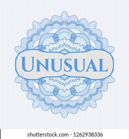 Light blue passport money rosette with text Unusual inside