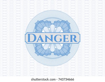 Light blue passport money style rossete with text Danger inside