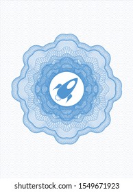 Light blue passport rosette with rocket icon inside