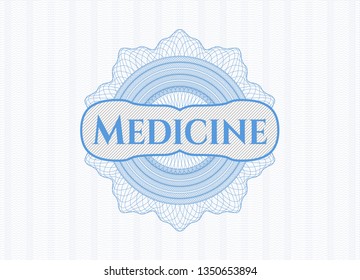 Light blue passport rosette with text Medicine inside