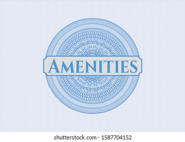 Light blue passport rosette with text Amenities inside