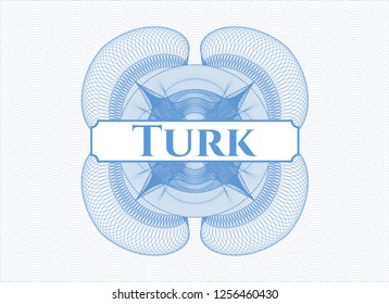 Light blue passport style rosette with text Turk inside