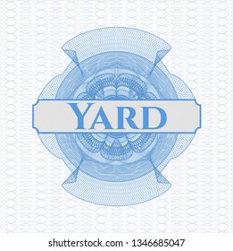 Light blue passport style rosette with text Yard inside