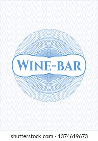 Light blue passport style rosette with text Wine-bar inside