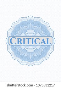 Light blue passport style rosette with text Critical inside