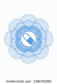 Light blue passport style rosette with pill icon inside