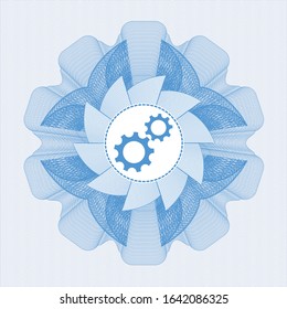 Light blue passport style rosette with gear, team work icon inside