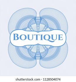 Light blue rosette or money style emblem with text Boutique inside