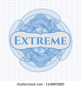 Light blue rosette (money style emblem) with text Extreme inside