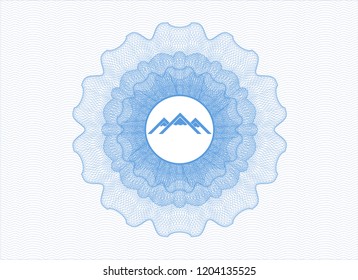 Light blue rosette (money style emblem) with mountain icon inside