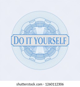 Light blue rosette or money style emblem with text Do it yourself inside