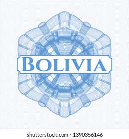Light blue rosette or money style emblem with text Bolivia inside
