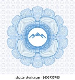 Light blue rosette (money style emblem) with mountain icon inside