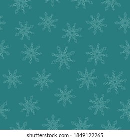 Light blue snowflakes mandala on calm turquoise background. Seamless winter monochrome pattern. Suitable for packaging, textile.