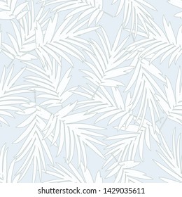 Light blue tropical seamless pattern with palm leaves. Botanic textile pattern design. Elegant tropical vector backdrop.