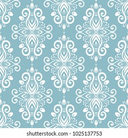 Light blue and white ornamental seamless pattern. Vintage, paisley elements. Ornament. Traditional, Ethnic, Turkish, Indian motifs. Great for fabric and textile, wallpaper, packaging