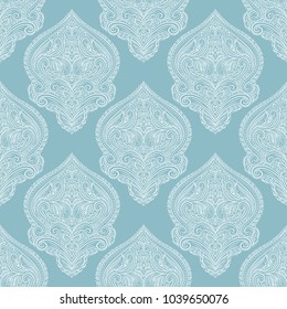 Light blue and white ornamental seamless pattern. Vintage, paisley elements. Ornament. Traditional, Ethnic, Turkish, Indian motifs. Great for fabric and textile, wallpaper, packaging