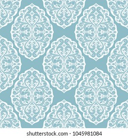 Light blue and white ornamental seamless pattern. Vintage, paisley elements. Ornament. Traditional, Ethnic, Turkish, Indian motifs. Great for fabric and textile, wallpaper, packaging