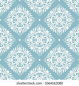Light blue and white ornamental seamless pattern. Vintage, paisley elements. Ornament. Traditional, Ethnic, Turkish, Indian motifs. Great for fabric and textile, wallpaper, packaging