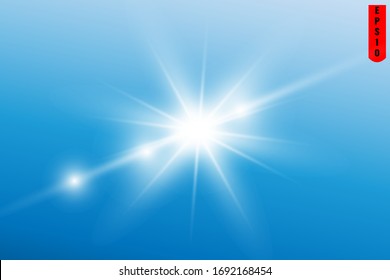 Light of the bright sun on the blue sky.