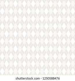 Light brown, white argyle pattern on background