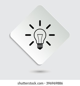 Light bulb - black vector icon  on a paper button