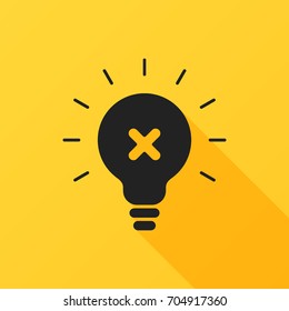 Light bulb and cross mark