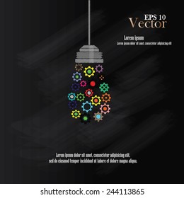 light bulb with gears and cogs working together on chalkboard  