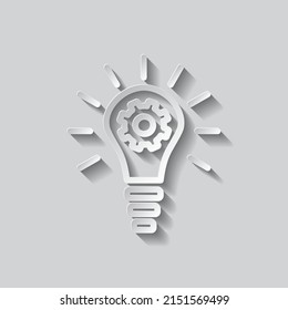 Light bulb with gears simple icon. Flat design. Paper style with shadow. Gray background.ai
