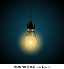 light bulb with glowing  on dark blue background eps 10