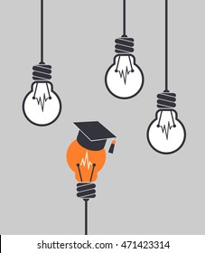 Light bulb with graduation cap different among the others. Educational concept