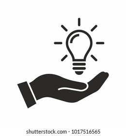 Light bulb in hand. Vector icon.