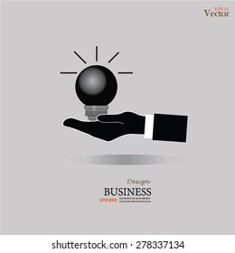 light bulb in hand.hand with light bulb.vector illustration.