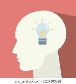 Light bulb in the head. Idea symbol