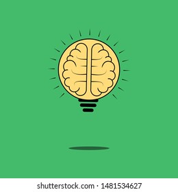 Light bulb with human brain inside on green background. 