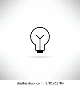 light bulb icon drop shadow on gray background