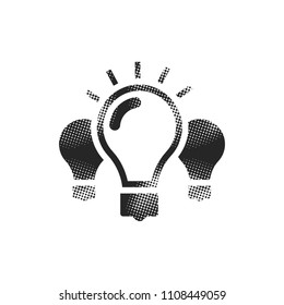 Light bulb icon in halftone style. Black and white monochrome vector illustration.