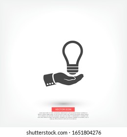 light bulb, icon. hand makes light. light bulb over hand. there is light in the hand. Vector EPS 10.