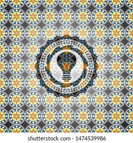 light bulb icon inside arabic badge. Arabesque decoration.