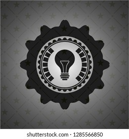 light bulb icon inside black emblem. Vintage.