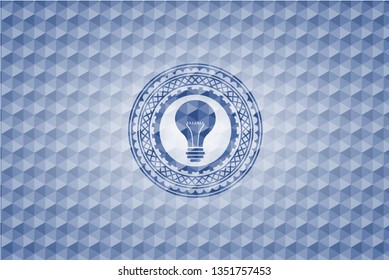 light bulb icon inside blue emblem with geometric pattern background.