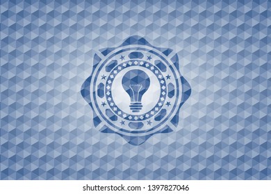 light bulb icon inside blue emblem or badge with abstract geometric polygonal pattern background.