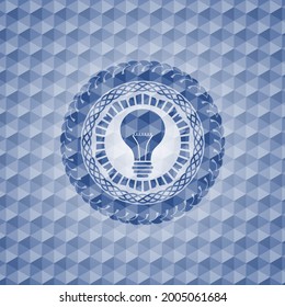 light bulb icon inside blue hexagon emblem. 