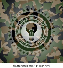 light bulb icon inside camouflage emblem