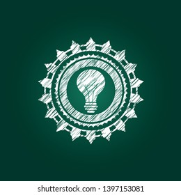 light bulb icon inside chalk emblem